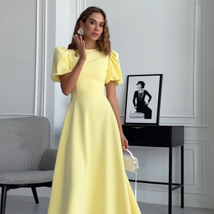 Women’s midi dress with a tailored A-line and voluminous puff sleeves Mune Fashion