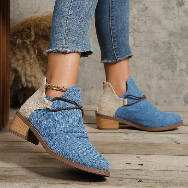 Women’s ankle boots with leopard print, canvas upper material, decorative braided strap, and low block heel Mune Fashion