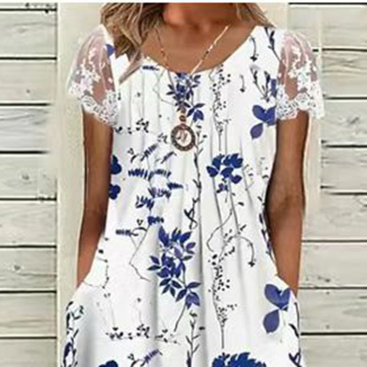 Ladies' airy A-line midi dress with lace sleeves, side pockets, and round neckline Mune Fashion
