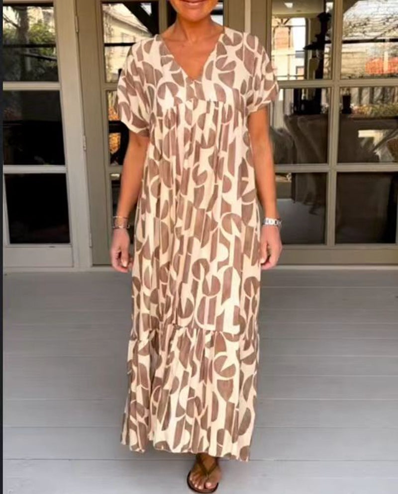 Women's voluminous maxi dress with under-bust seam, V-neck, short kimono sleeves, and tiered ruffle Mune Fashion