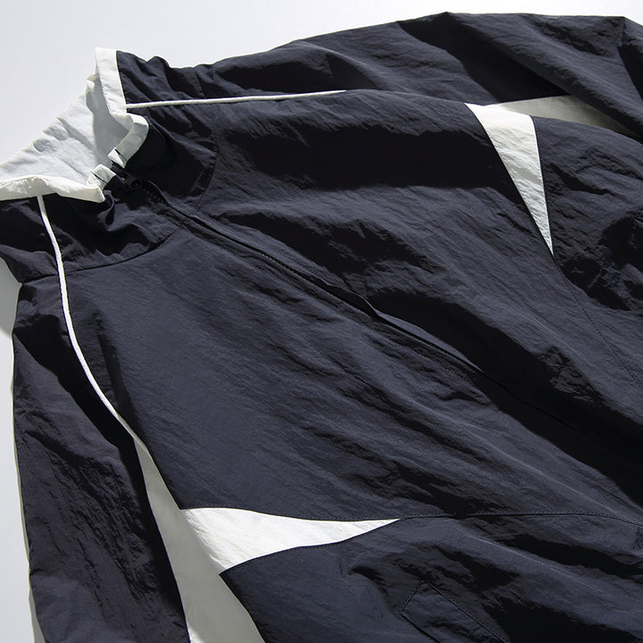 Unisex Lightweight Boxy Hooded Jacket in Windbreaker Style with Contrast Panels and Raglan Sleeves Mune Fashion
