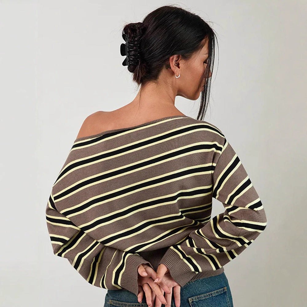 Women's fine knit boatneck pullover with asymmetrical shoulder drop, wide ribbed hem, and casual balloon sleeves Mune Fashion