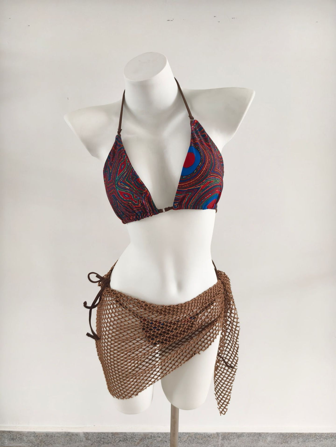 Ladies triangle bikini with trendy net skirt details Mune Fashion