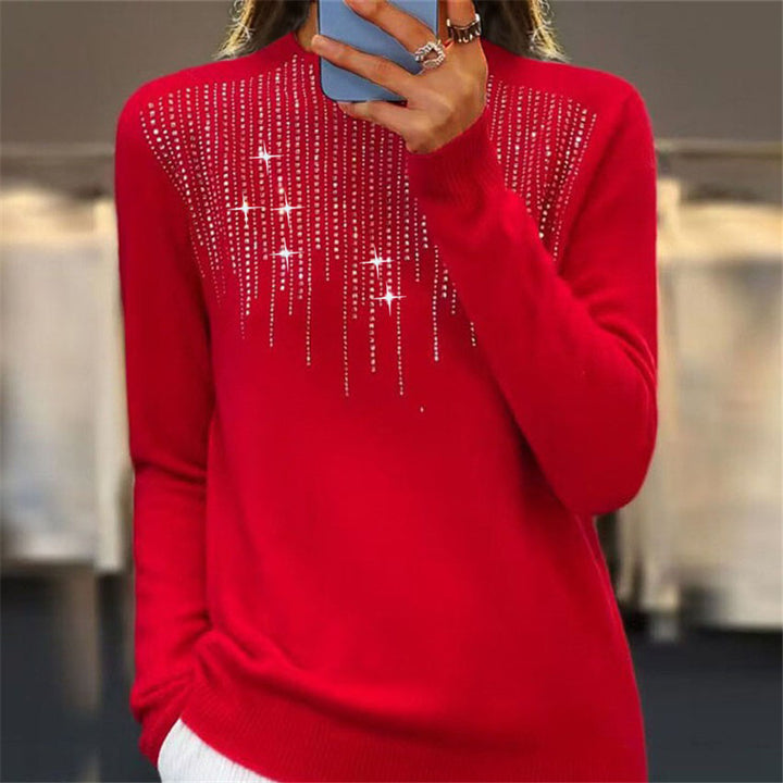 Women's cozy fine knit sweater with subtle rhinestone embellishment at the round neckline and ribbed hem Mune Fashion
