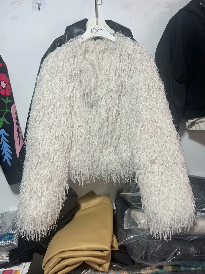 Women's short faux fur jacket with shaggy fringe texture, soft lining and boxy cropped cut Mune Fashion