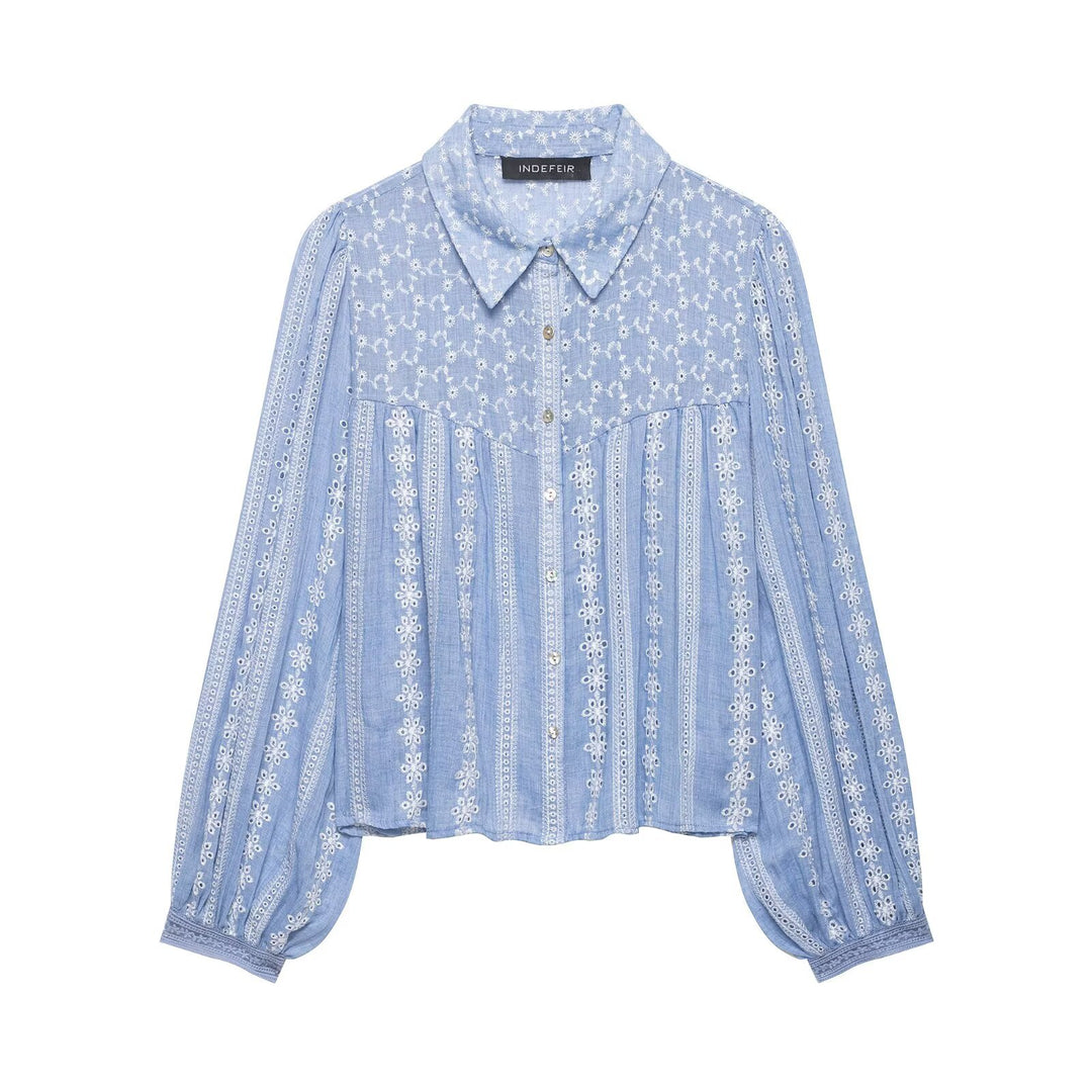 Women's loosely fitted embroidered blouse with broderie details, button placket, and voluminous balloon sleeves Mune Fashion