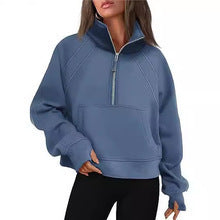 Ladies oversized short pullover with stand-up collar, half zipper and kangaroo pocket Mune Fashion