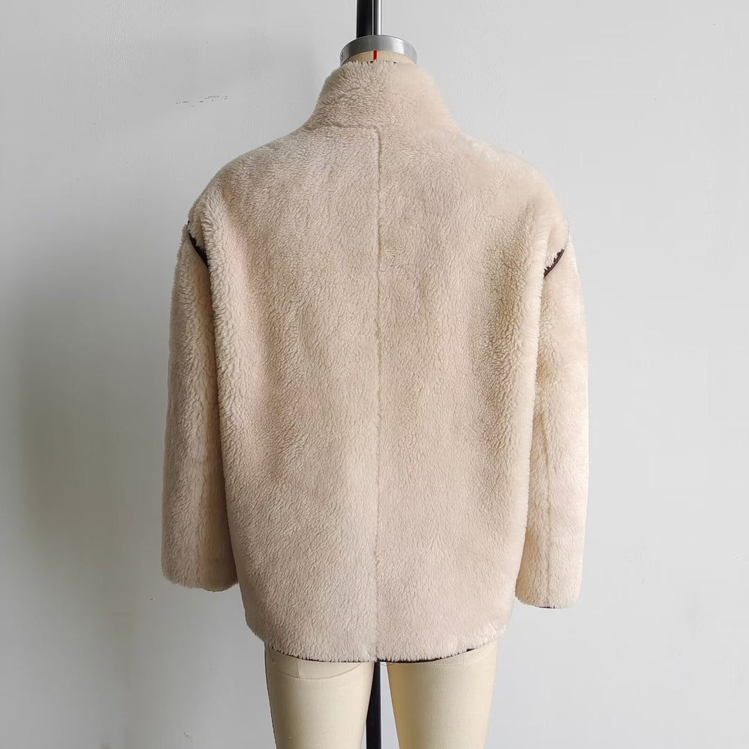 Women's short sheepskin look jacket with stand-up collar, concealed button placket and side pockets Mune Fashion