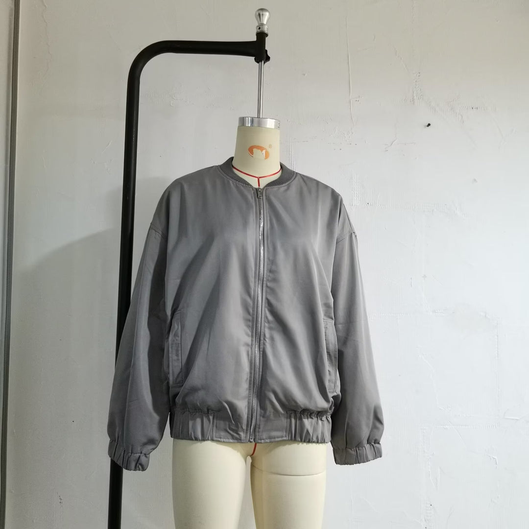 Unisex nan lighter oversized bomber jacket with continuous metal zipper, ribbed collar, and elastic hem Mune Fashion