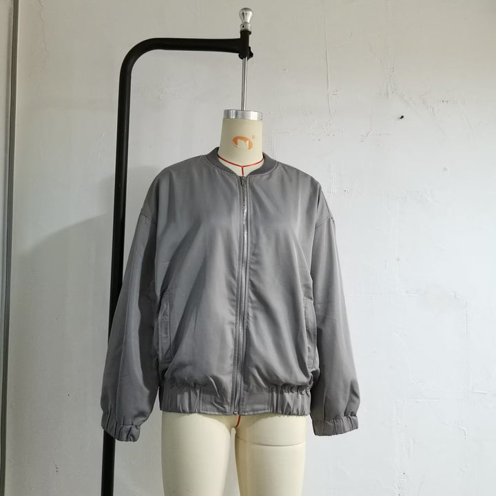 Unisex nan lighter oversized bomber jacket with continuous metal zipper, ribbed collar, and elastic hem Mune Fashion