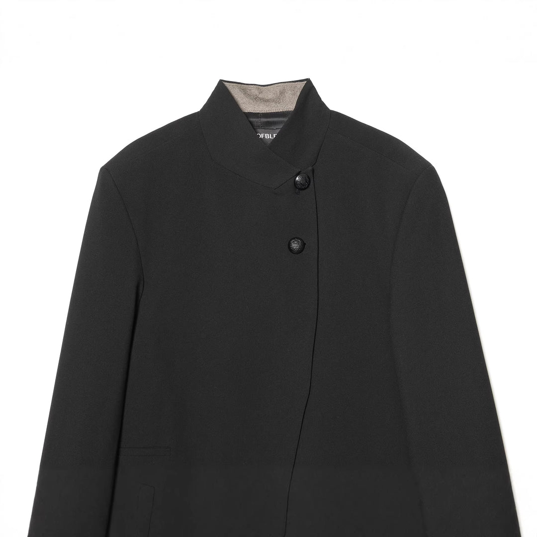 Women's tailored stand collar blazer with hidden asymmetrical front and decorative buttons Mune Fashion