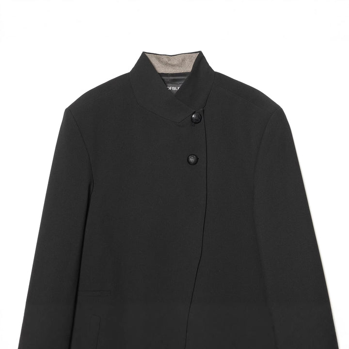 Women's tailored stand collar blazer with hidden asymmetrical front and decorative buttons Mune Fashion