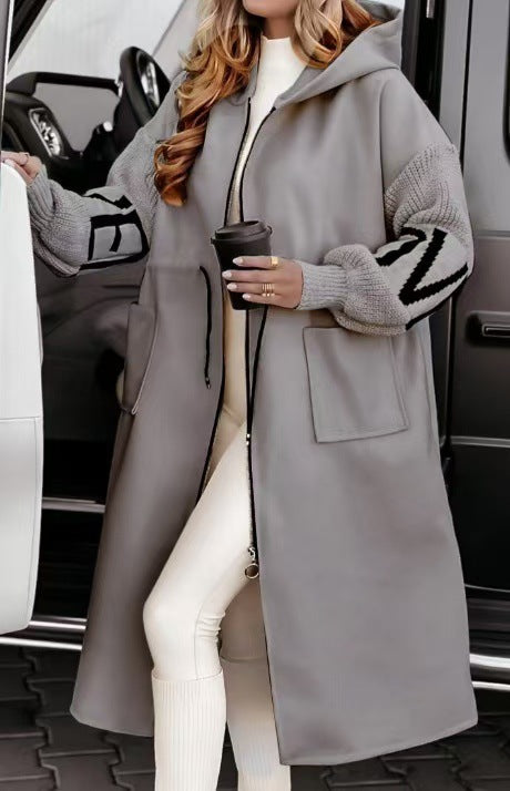 Women’s hooded coat with oversized cut, knitted sleeve cuffs and patch pockets Mune Fashion