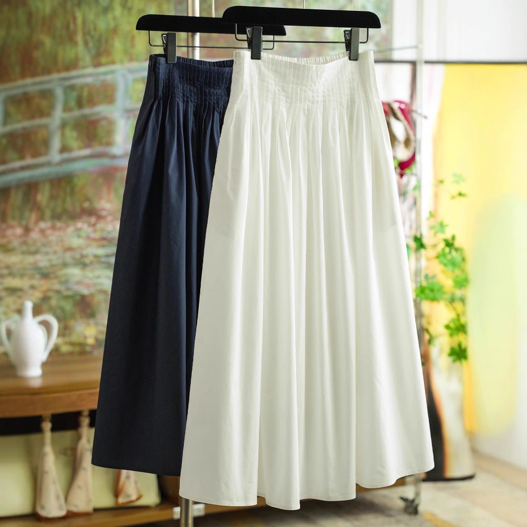 Women's midi skirt with high-rise pleated waistband and wide, gathered volume
