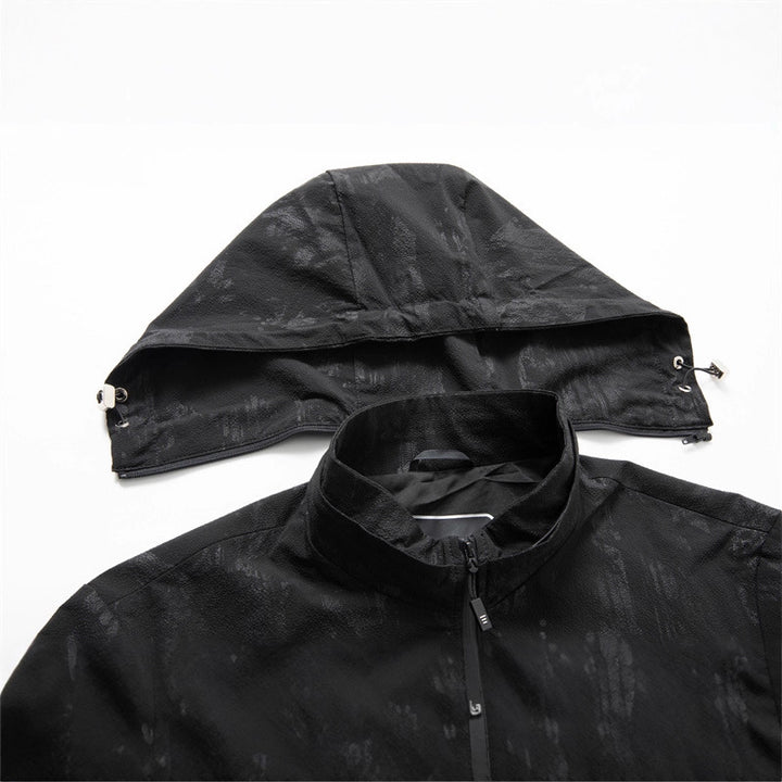 Men's lightweight softshell transitional jacket with hood, water-repellent coating and reflective zippered pockets Mune Fashion