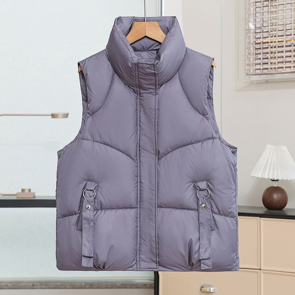 Women's padded quilted vest with high standing collar and decorative ring loops Mune Fashion