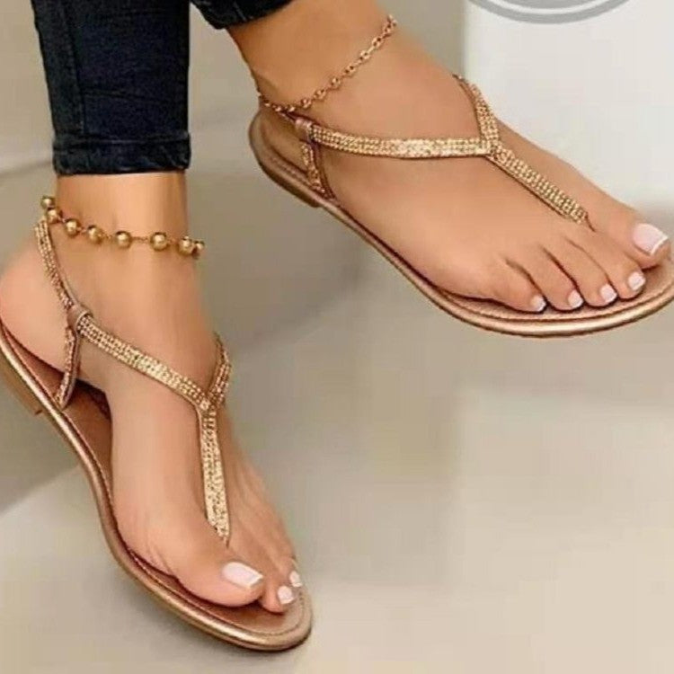 Ladies' T-strap sandal with sparkling rhinestone embellishment and padded comfort insole Mune Fashion