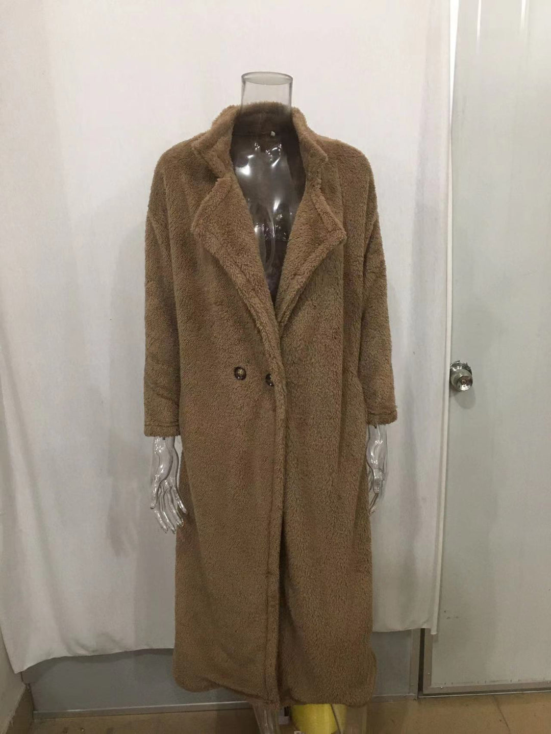 Ladies longer teddy coat with large lapel collar, double button placket and practical side pockets Mune Fashion