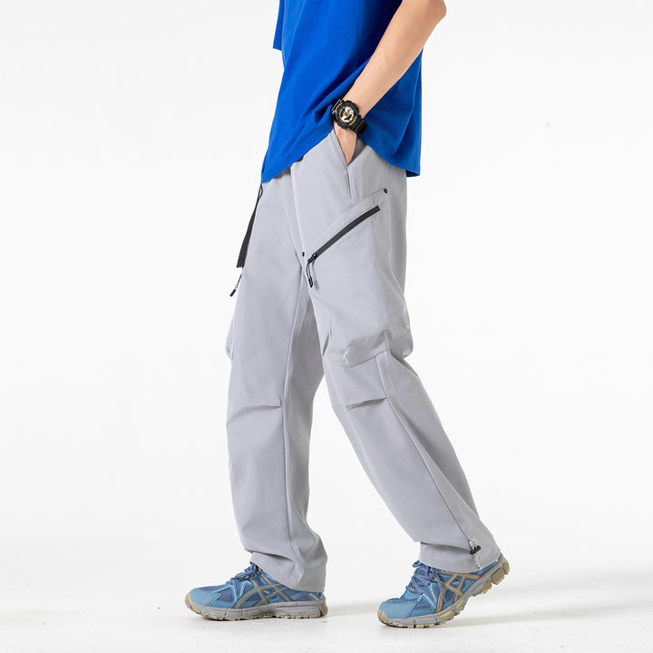 Men's Loose Utility Cargo Pants with Elastic Waistband, Zipper Pockets, and Adjustable Hem Drune