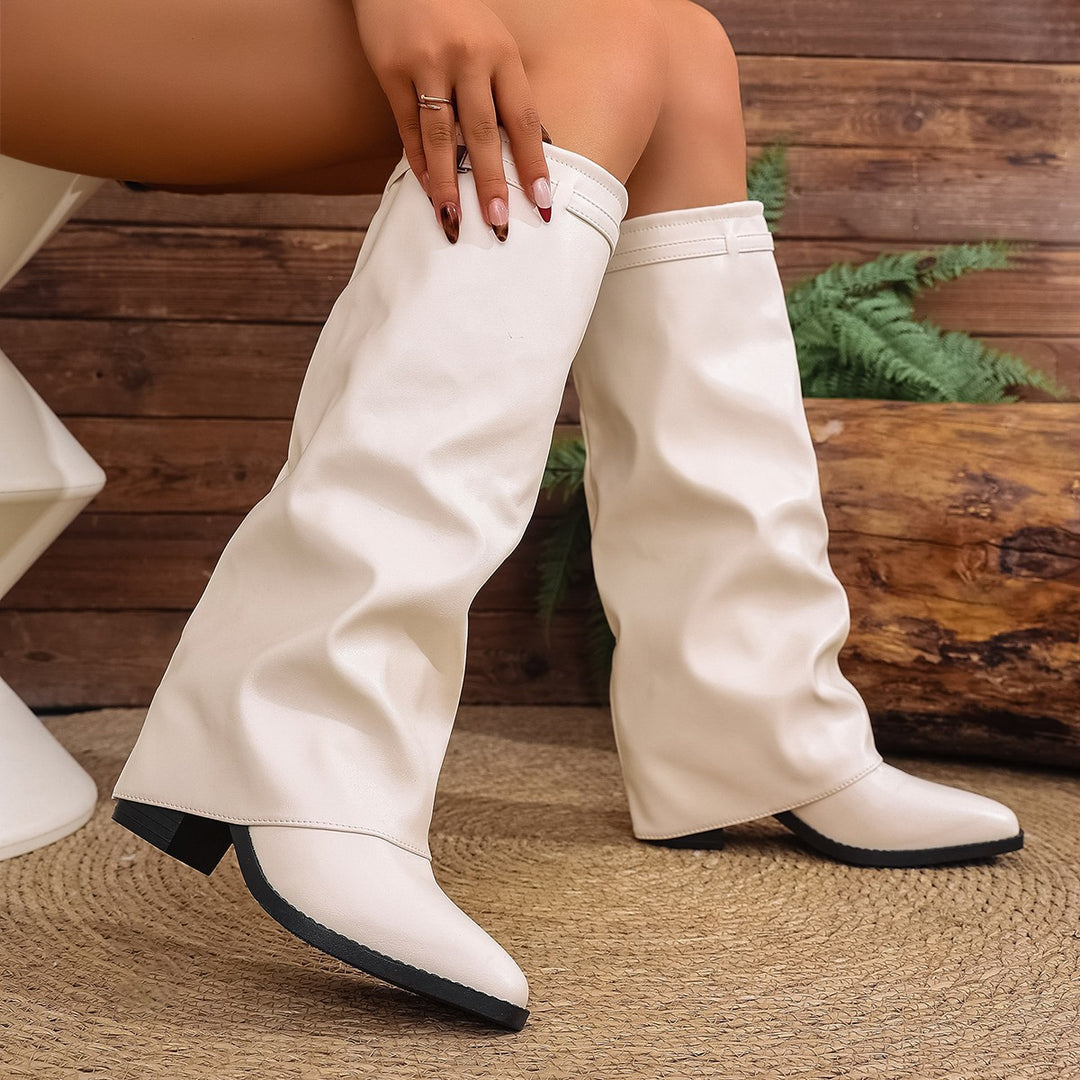 Women's knee-high slouch boots with pointed toe, low block heel, and decorative shaft strap Mune Fashion