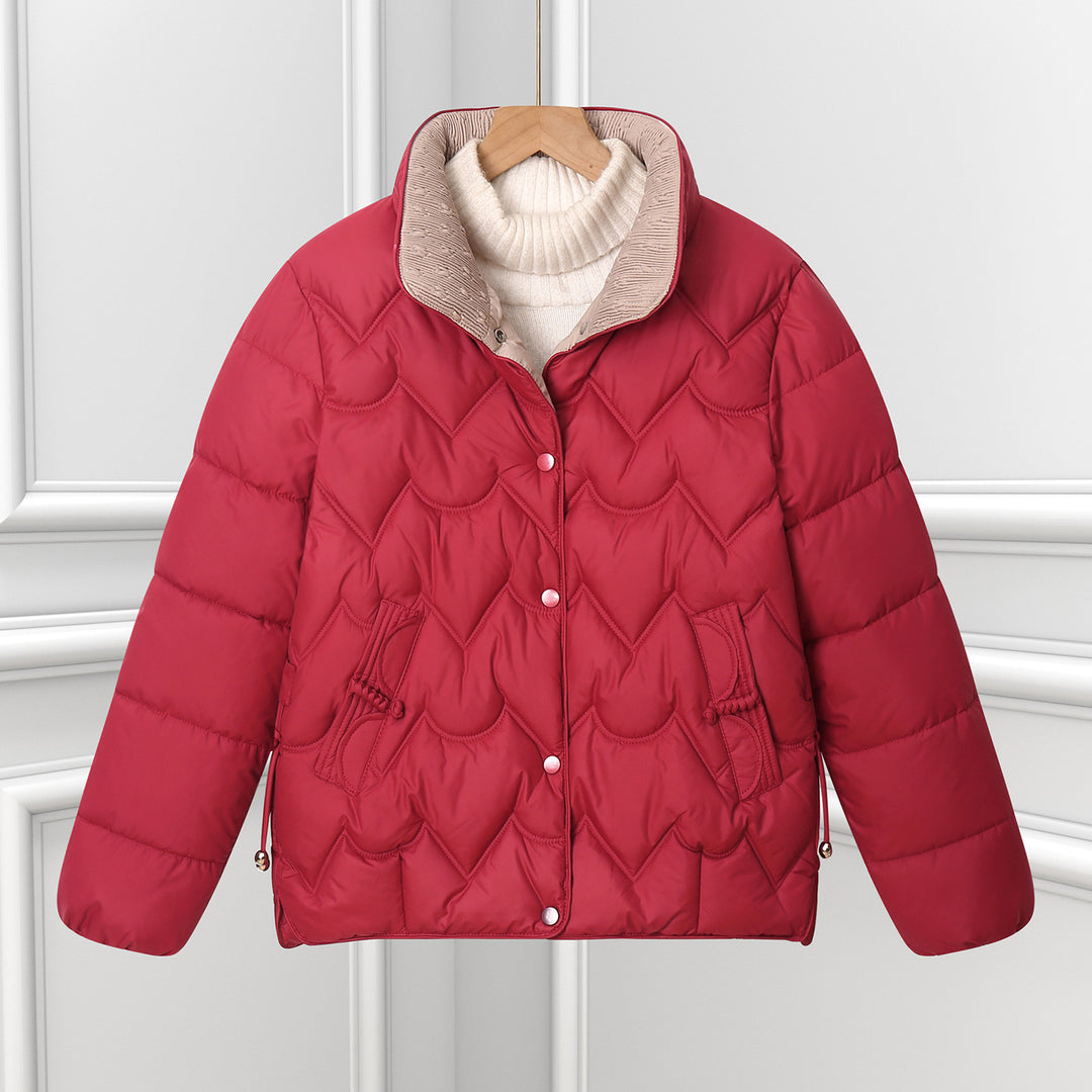Women's short quilted puffer jacket with decorative curved quilting and snap button placket Mune Fashion