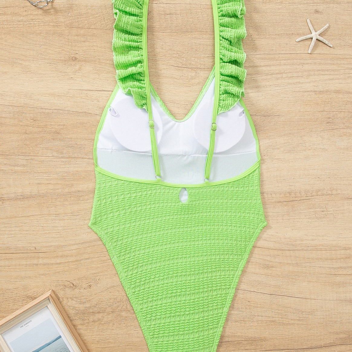 Ladies' one-piece swimsuit with ruffle details and high leg cut Mune Fashion