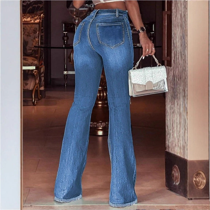 Women high-waisted flared trousers made of stretch denim with flared leg, knee rips, and frayed hem Mune Fashion