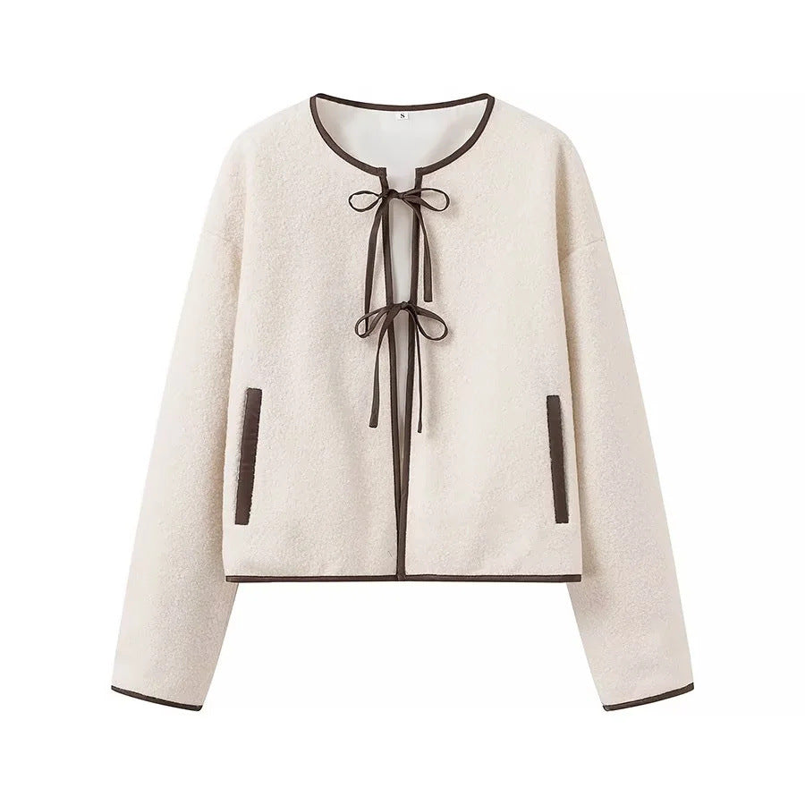 Ladies short cut teddy jacket with tie bands and contrast piping Mune Fashion