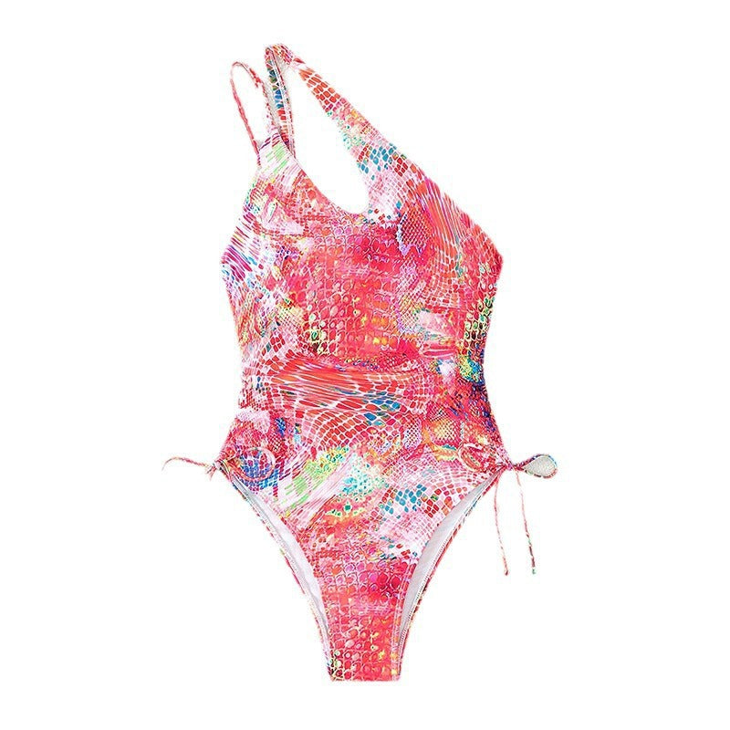 Women's one-piece swimsuit with asymmetrical cut and playful tie band Mune Fashion