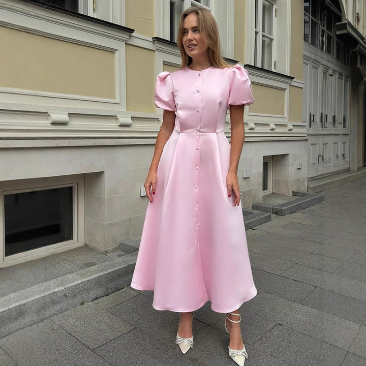 Ladies' midi dress made of satin with voluminous puff sleeves, fitted A-line and continuous button placket Mune Fashion