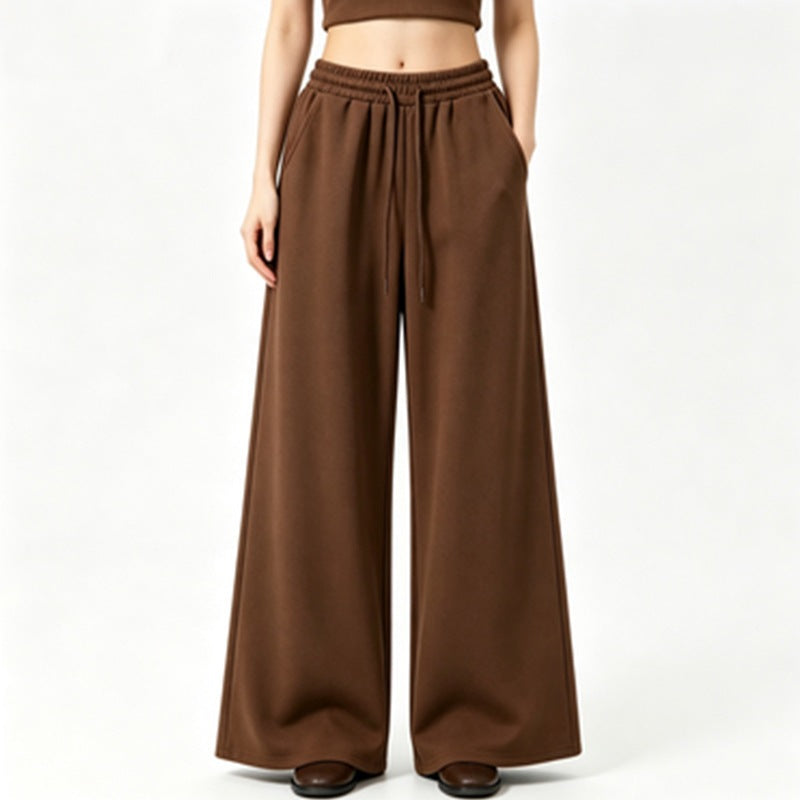 Ladies wide high-waist lounge pants with elastic waistband, drawstring, and flowing jersey Mune Fashion