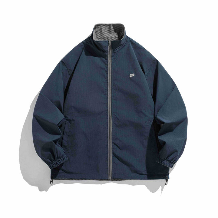 Unisex structure fleece jacket with high stand-up collar, zip pockets and drawstring hem Mune Fashion