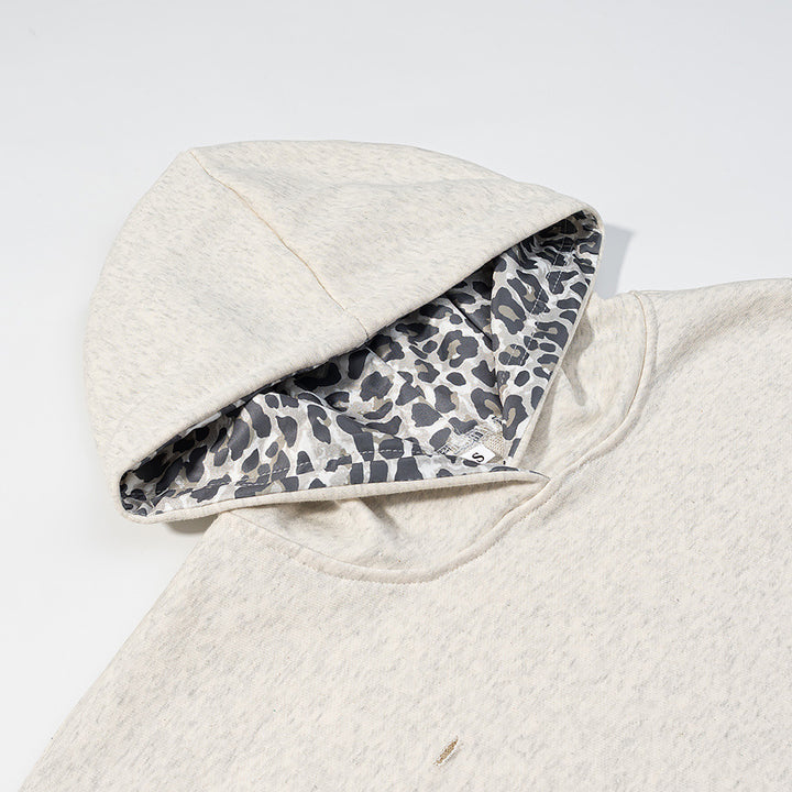 Women's oversized hoodie with leopard pattern lining, kangaroo pocket, and vintage effect Mune Fashion