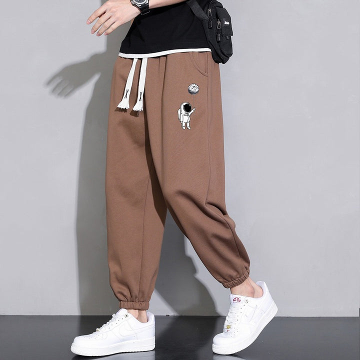 Men's Loose Jogging Pants with Astronaut Print, Drawstring Waistband and Elastic Cuffs Mune Fashion