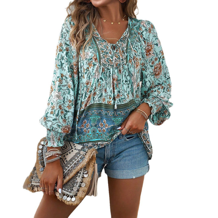 Women's loose Boho tunic with V-neck, tie belt, gathered sleeves, and floral pattern Mune Fashion