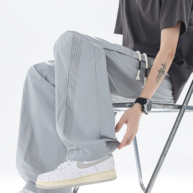 Men's sporty leisure pants with innovative mesh inserts