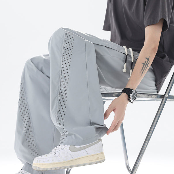 Men's sporty leisure pants with innovative mesh inserts