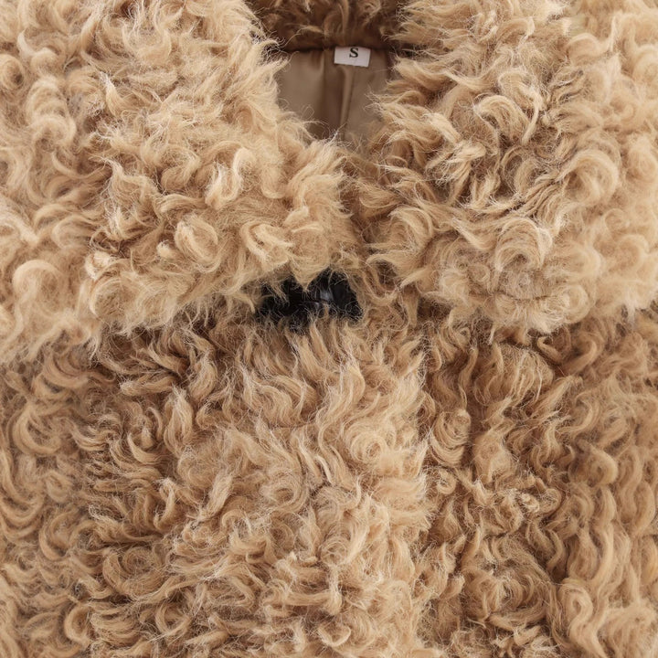 Women's short boucle teddy jacket with curly woven texture, shirt collar, and button closure Mune Fashion
