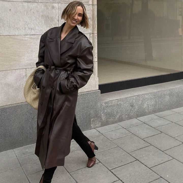Ladies Maxilength Oversize Faux Leather Trench Coat with Wide Lapels and Waist Belt Mune Fashion