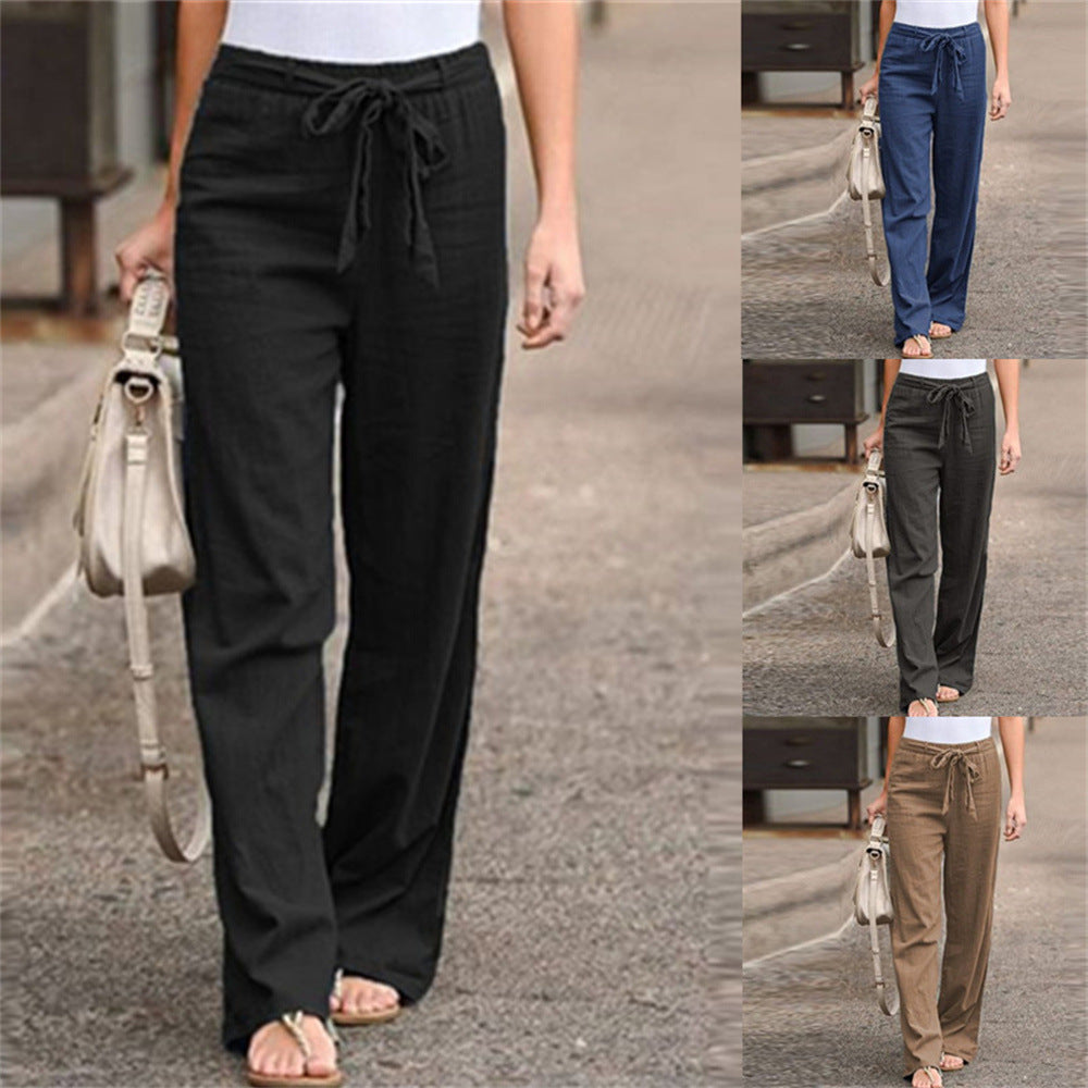 Women's loose linen pants with drawstring waistband, straight leg and side pockets Mune Fashion