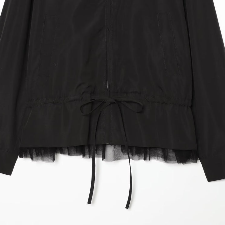 Women's windbreaker jacket in blouson cut with stand-up collar, drawstring and tulle hem.
