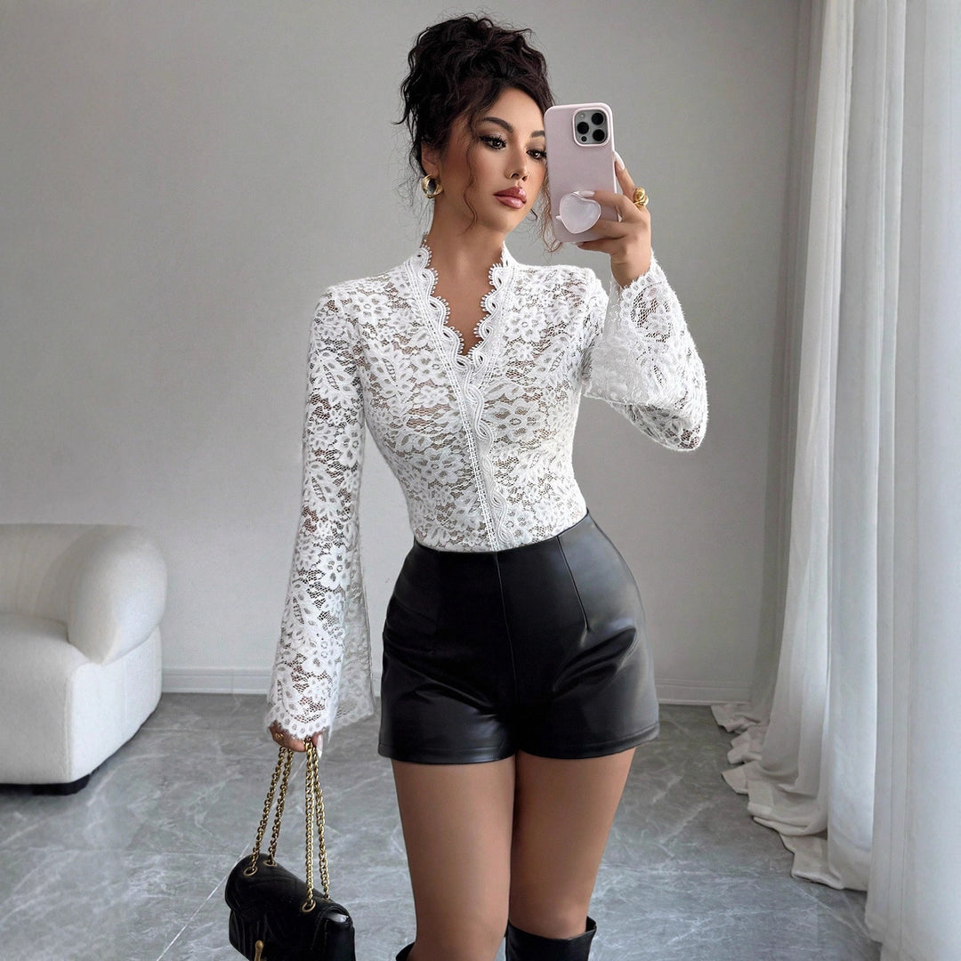 Women’s fitted lace top with curved lace collar and flared bell sleeves Mune Fashion