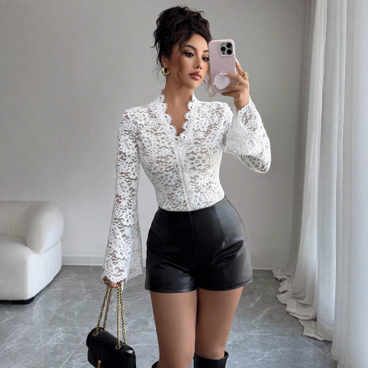 Women’s fitted lace top with curved lace collar and flared bell sleeves Mune Fashion