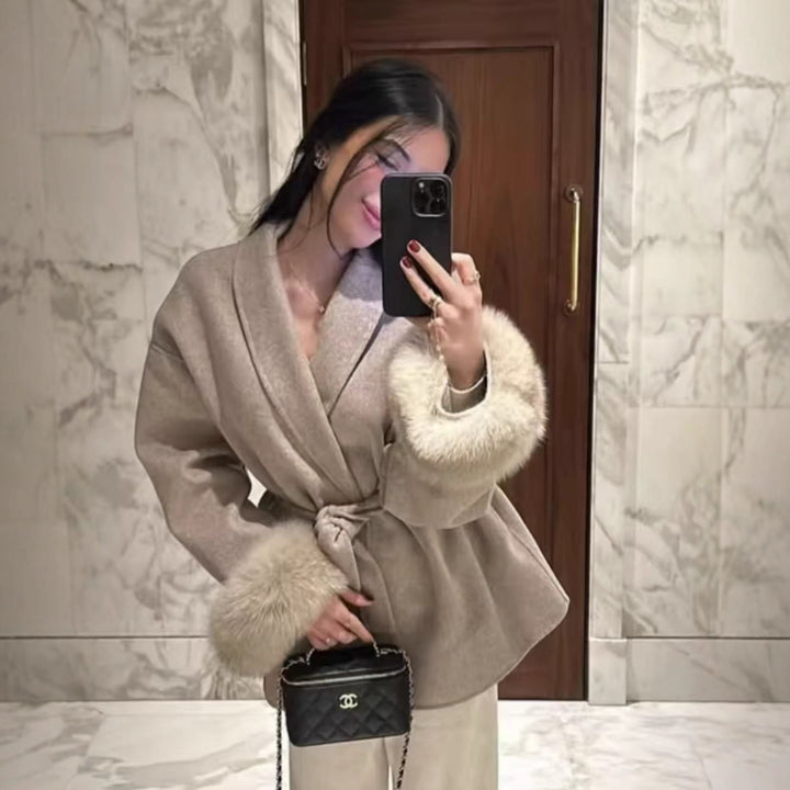 Women's fitted coat with belt tie, shawl collar and voluminous faux fur cuffs Mune Fashion