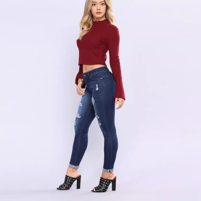 Women high-rise skinny jeans with destroyed details and rolled ankle cuffs Mune Fashion