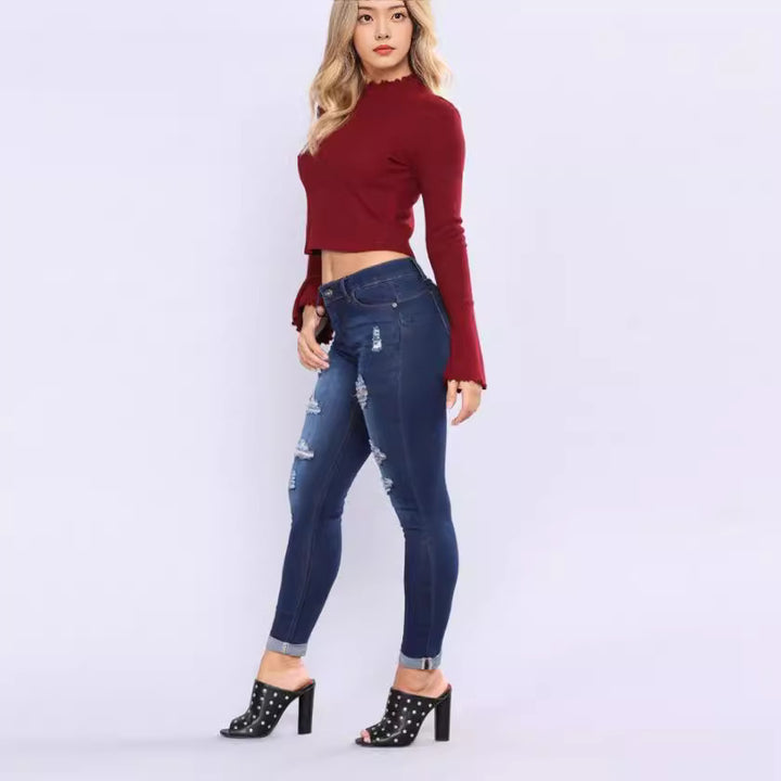 Women high-rise skinny jeans with destroyed details and rolled ankle cuffs Mune Fashion