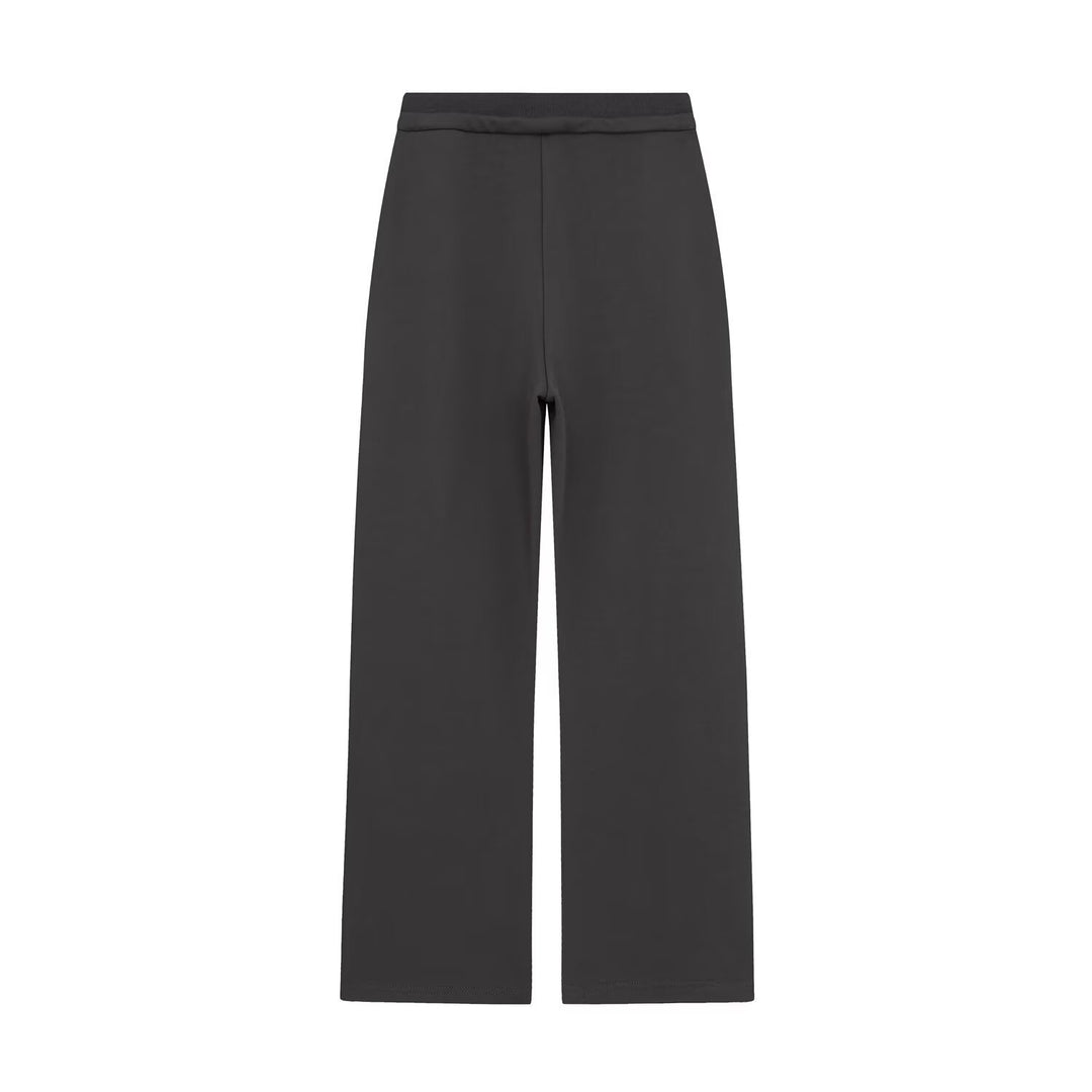 Women's wide high-waist palazzo pants with elastic waistband and flowing silhouette Mune Fashion