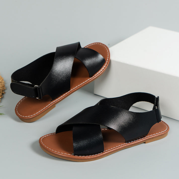 Women  lightweight leather sandals with crossed straps and padded outsole Mune Fashion
