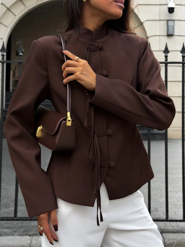 Women's fitted jacket with stand-up collar, Chinese knot fastenings, and slightly cropped cut.