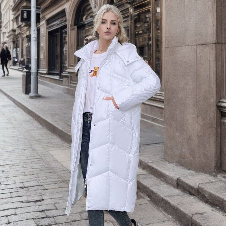 Women's Long Insulated Puffer Jacket with Voluminous Cut and Practical Side Pockets Mune